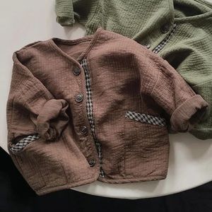 Brown V neck loose cardigan. Buttons in front, pockets. Super soft. Never worn.